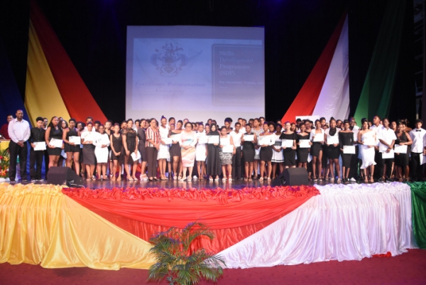 The graduates in a souvenir photograph with guests (Photo: Thomas Meriton)