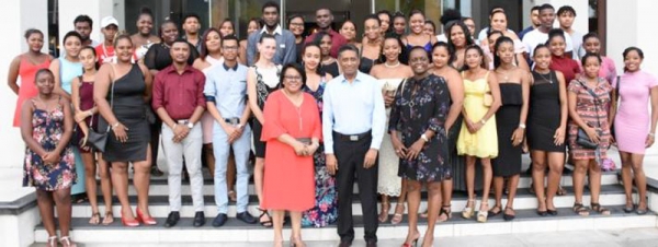 The graduates in a souvenir photograph with President Faure, Minister Télémaque and other guests